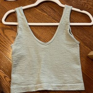 Sage green tank top.